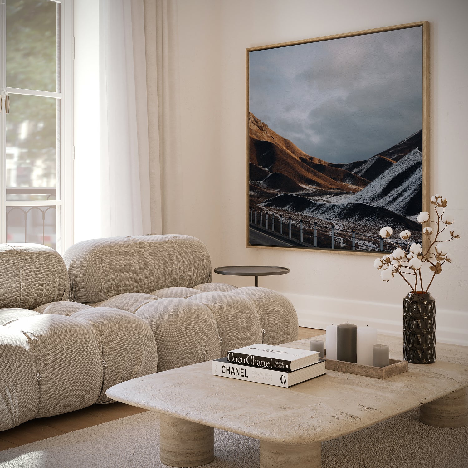 Modern living room with beige sofa, coffee table, and wall art